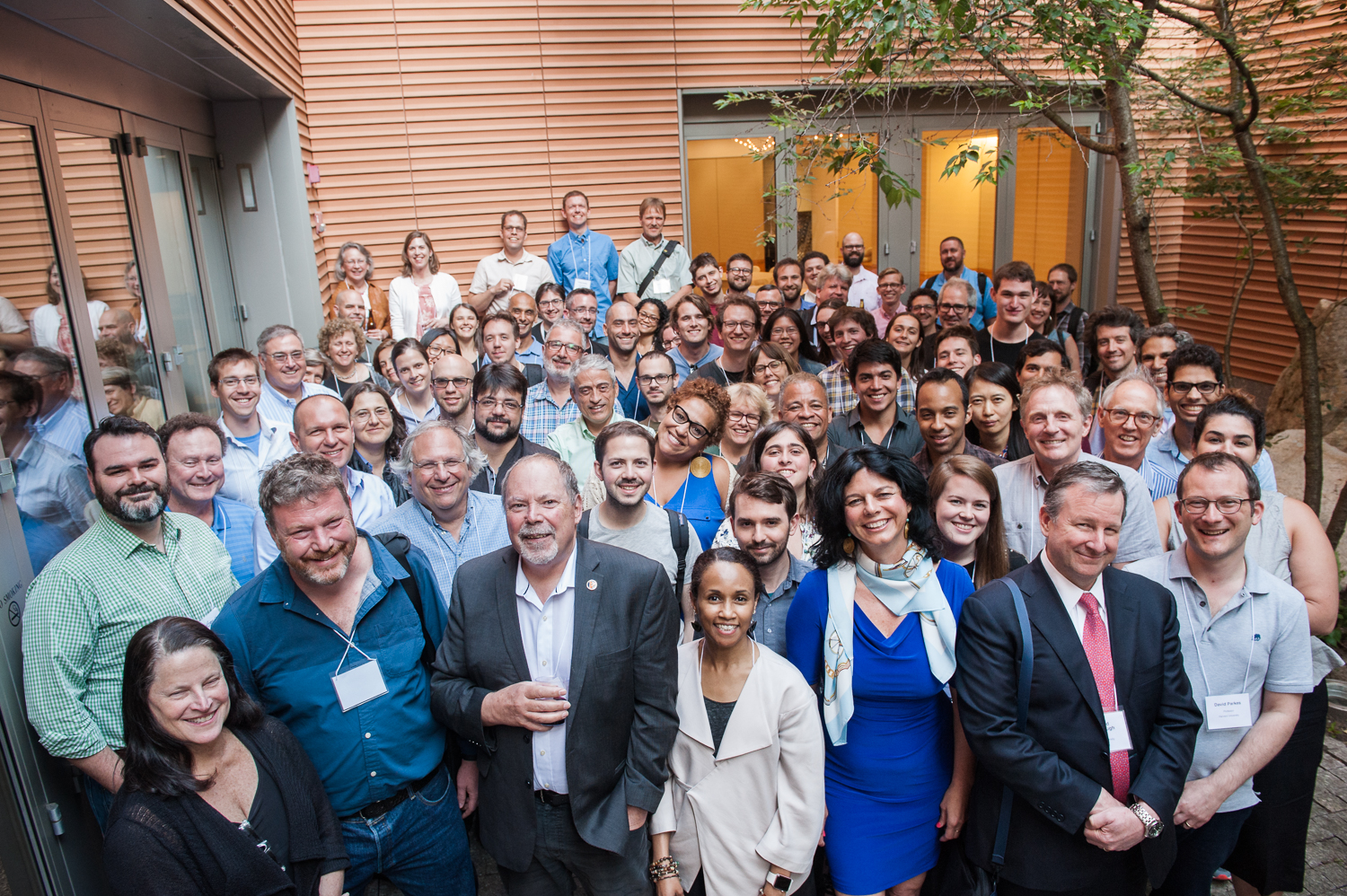 Photo of attendees filling the garden for a group photo at Dataverse Community Meeting 2017. Photo by Dwayne Liburd.