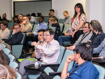 Photo of an attendee asking a question