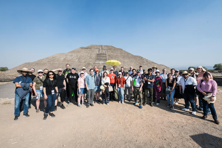 Photo of attendees at a social outing at the Teotihuacan pyramids